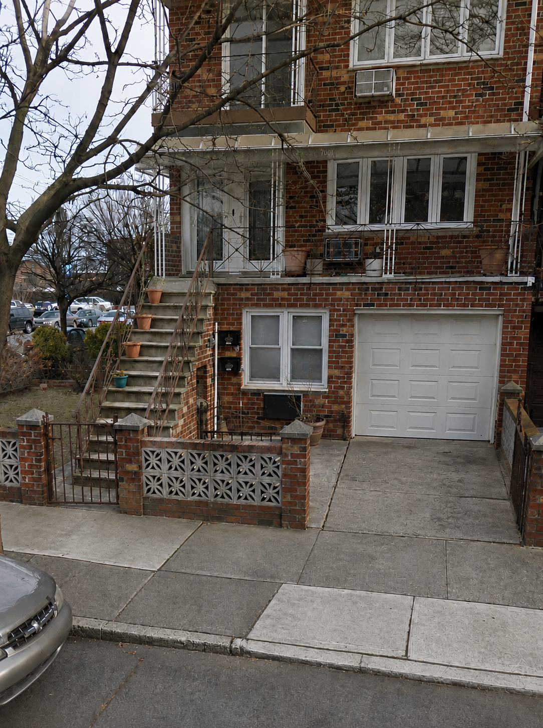 Before porch and steps construction work by Captain Construction Corp.