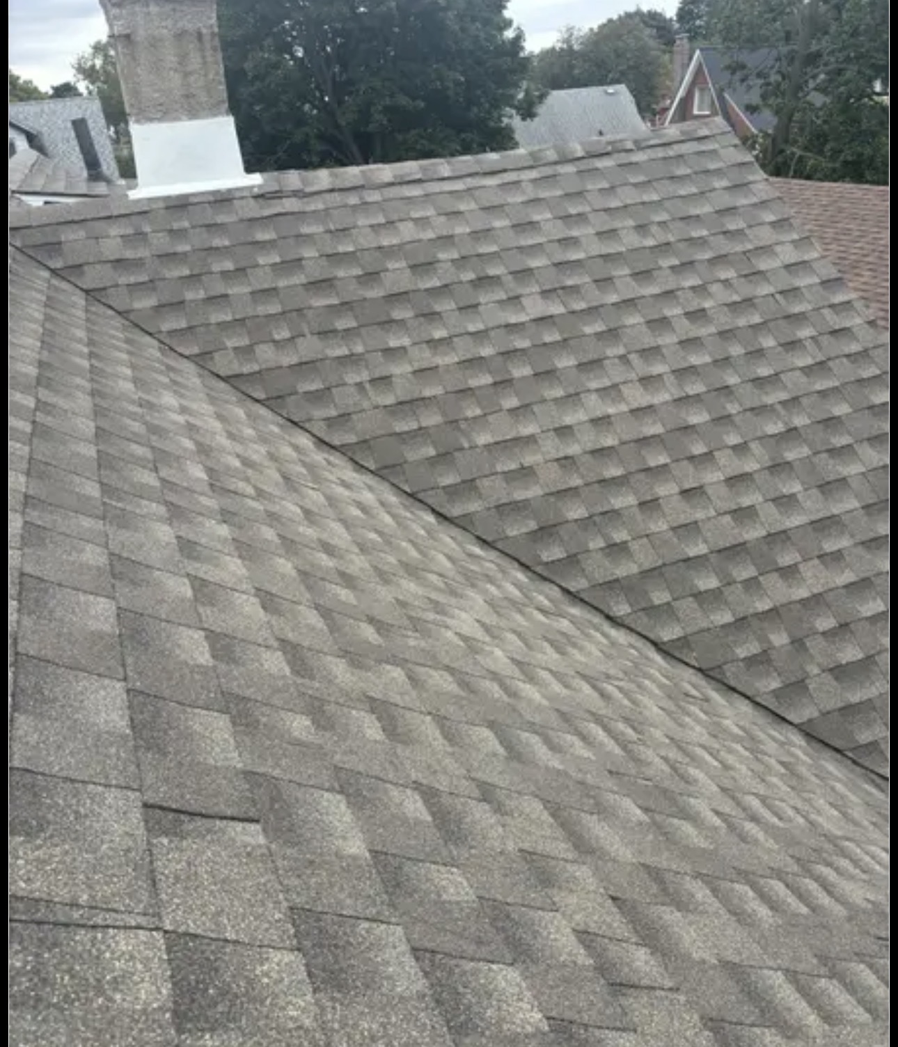 Shingle roof replacement by Captain Construction Corp.